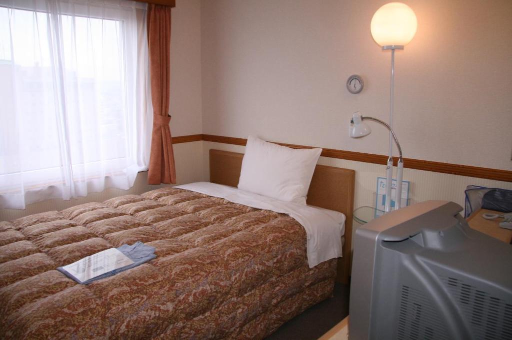 Toyoko Inn Hirosaki Ekimae Habitación foto
